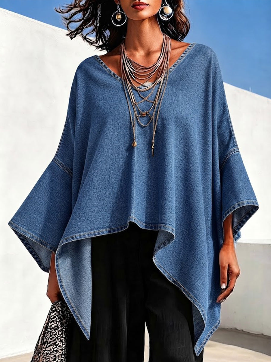 Loose-fit Denim V-neck Cape-style Top Featuring Wide Flared Sleeves, An Asymmetrical Hem, And A Flattering Silhouette