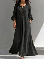 Long Dress Featuring A Partial Button-front, Gathered Details, Ruffled Three-quarter Sleeves, And A Flattering, Figure-concealing Fit