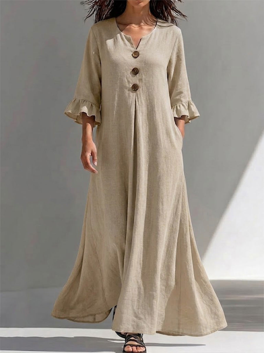 Long Dress Featuring A Partial Button-front, Gathered Details, Ruffled Three-quarter Sleeves, And A Flattering, Figure-concealing Fit