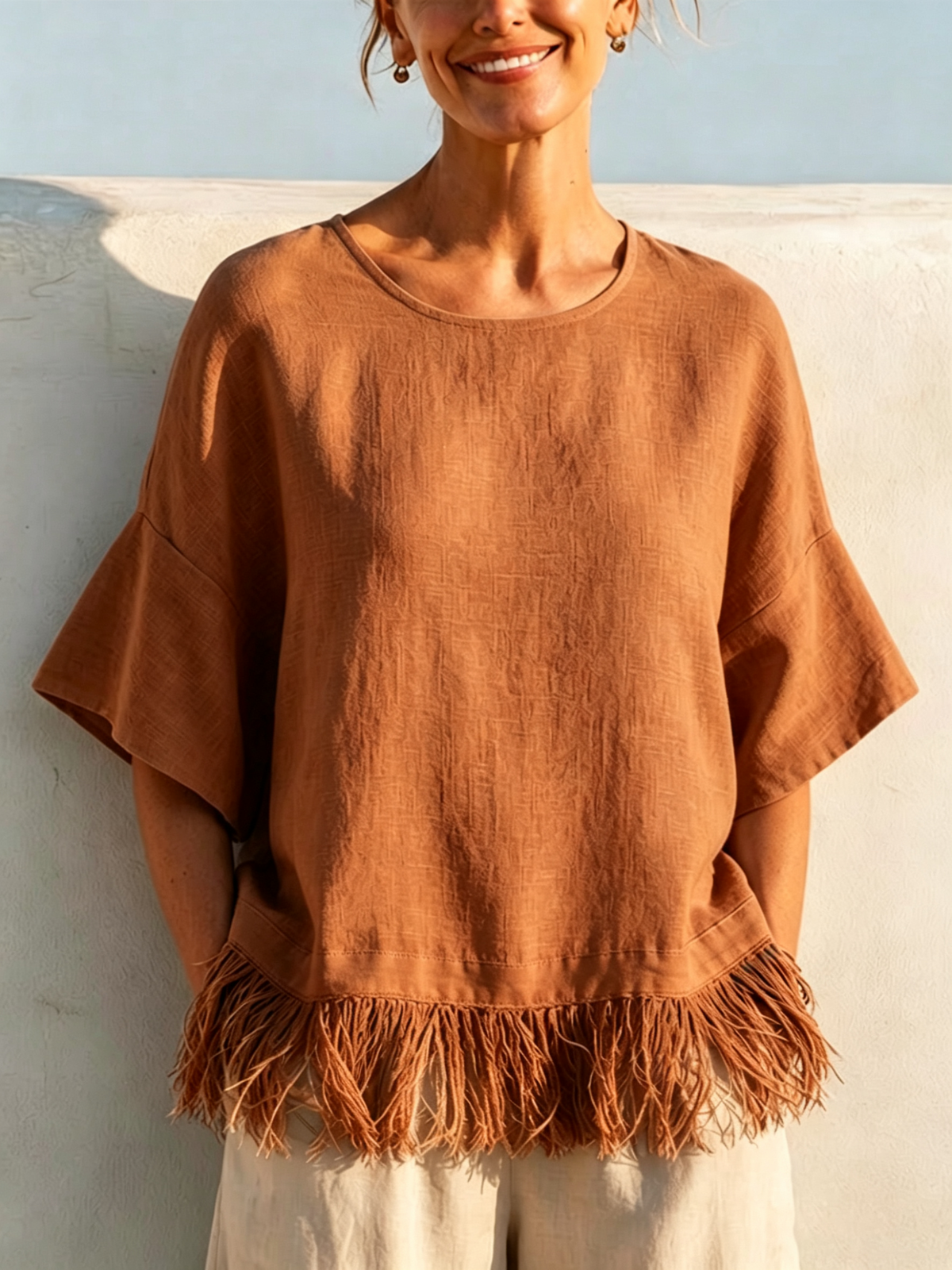 Solid-color Washed Linen Loose-fit Top Featuring A Round Neck, Ruffled Mid-length Sleeves, And A Tassel Hem—designed For A Relaxed, Flattering Fit