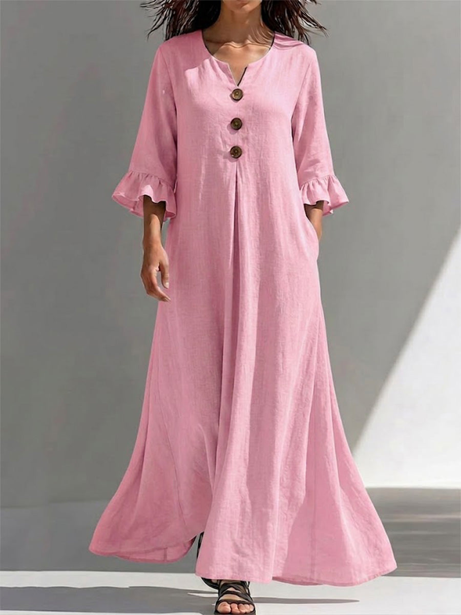 Long Dress Featuring A Partial Button-front, Gathered Details, Ruffled Three-quarter Sleeves, And A Flattering, Figure-concealing Fit