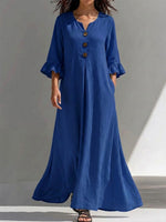 Long Dress Featuring A Partial Button-front, Gathered Details, Ruffled Three-quarter Sleeves, And A Flattering, Figure-concealing Fit