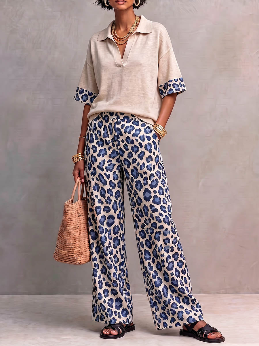 Women's Two-piece Set Featuring A Casual Loose-fitting Short-sleeved Collared Pullover Top And High-waisted Loose-fitting Wide-leg Trousers With A Leopard Print.